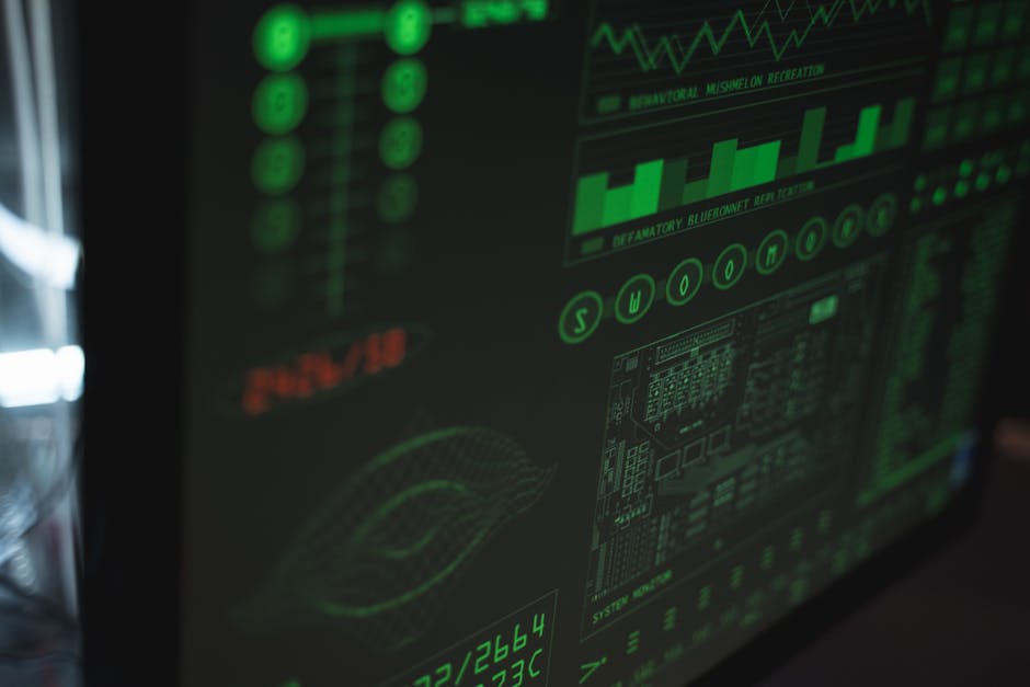 Conceptual image of a headset and a glowing login screen on a dark desk — illustrating the voice-phishing-to-single-sign-on chain behind these breaches.