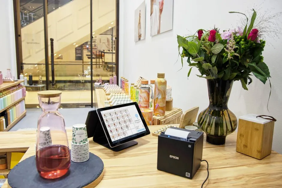 A point-of-sale tablet on a small retail shop counter, illustrating SME digital and cyber readiness.
