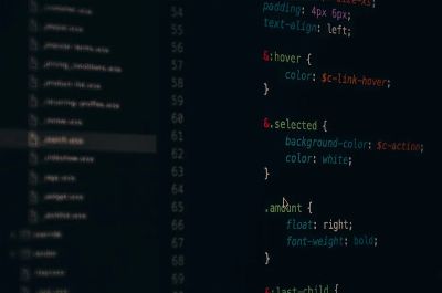 Close-up of colorful CSS code lines on a computer screen for web development.