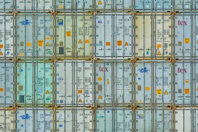 A vibrant display of stacked shipping containers, highlighting industrial organization.