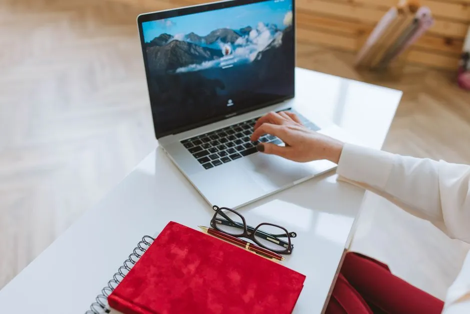Working at a laptop — picking a daily AI assistant