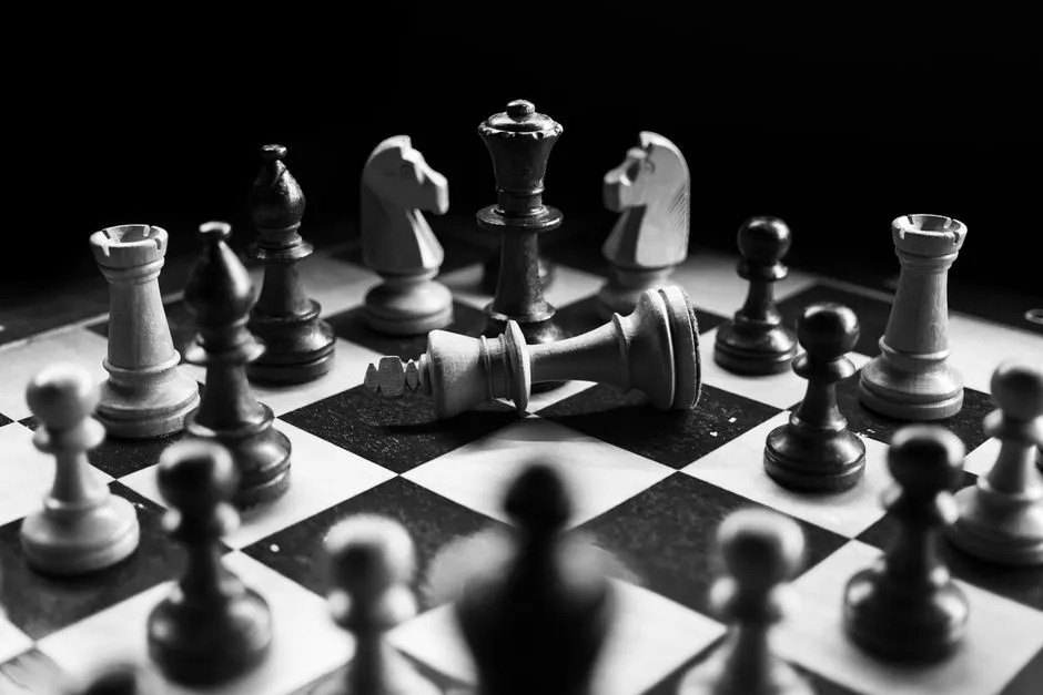 Chessboard with a fallen king — four agent frameworks, four very different positions in 2026