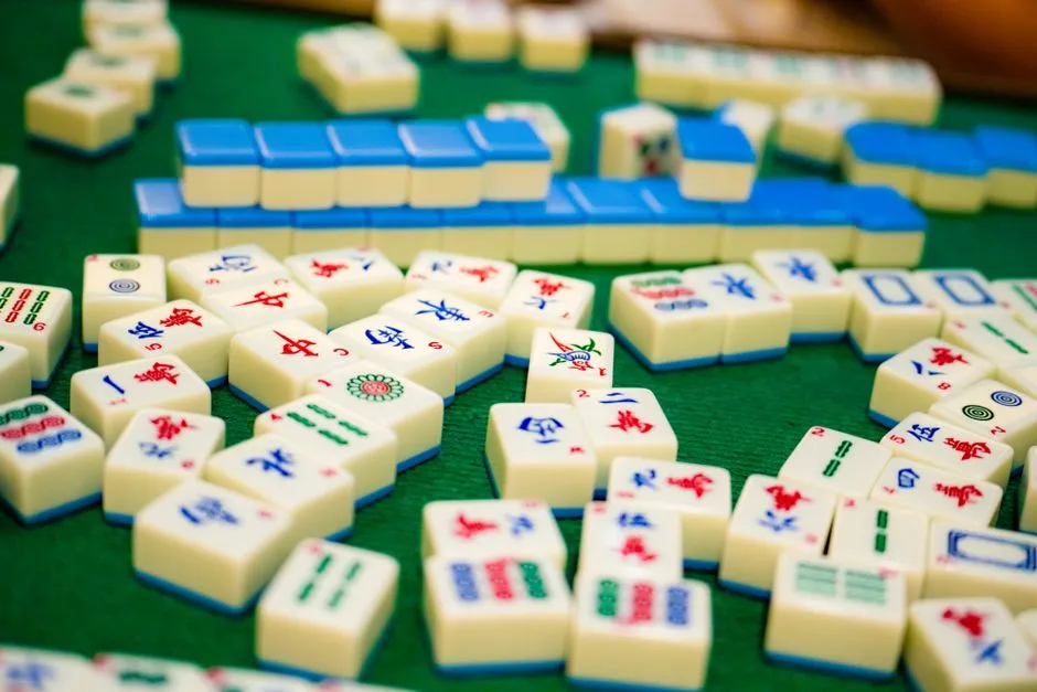 Mahjong tiles laid out face up on a table
