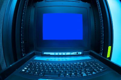 Close-up of a blue screen error shown on a data center control terminal.