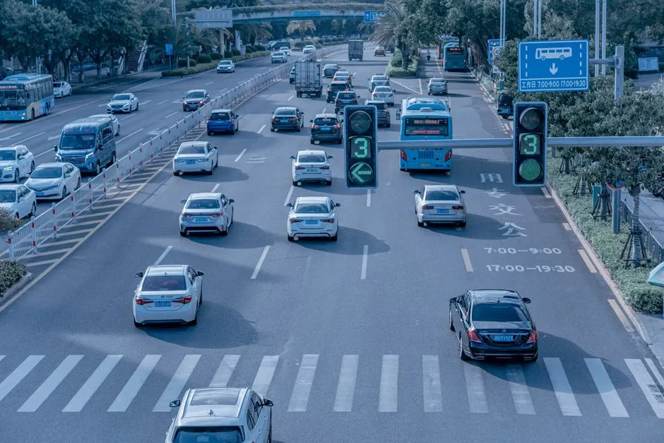 Traffic at a wide city intersection in China, illustrating a report on the Guangzhou company Pony.ai expanding its robotaxi service into Europe.