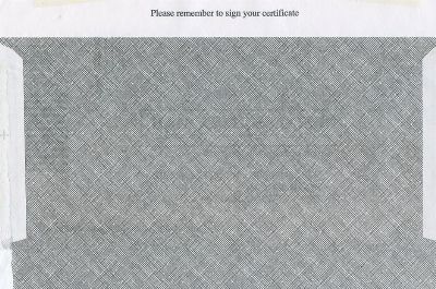 Close-up view of security paper with text reminding to sign certificate.