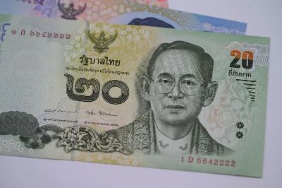 Detailed image of a 20 Thai Baht banknote highlighting traditional Thai design and currency features.