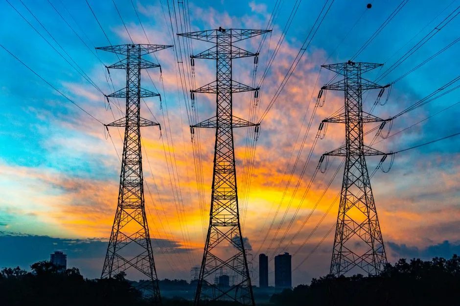 High-voltage transmission pylons against a dusk sky; how much power Malaysia's approved data centres will draw has not been disclosed