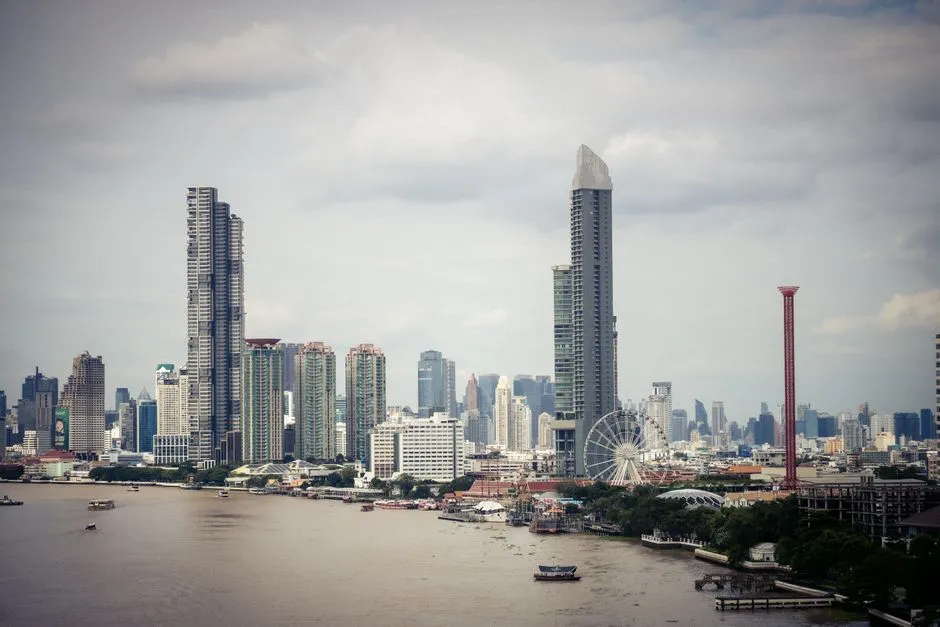 Bangkok's skyline above the Chao Phraya River; the city is hosting the IMF and World Bank Annual Meetings where the Blueprint was launched