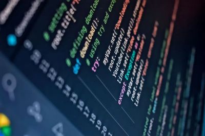 Close-up of a computer screen displaying colorful programming code with depth of field.