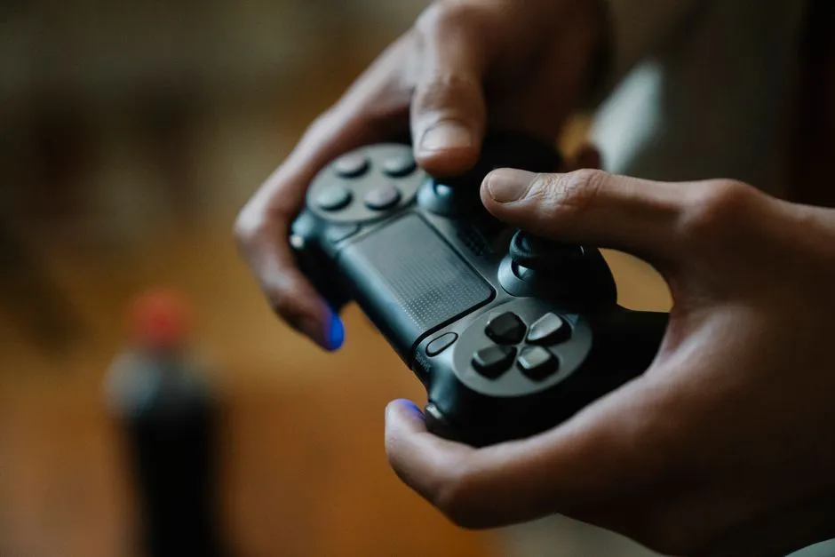 Hands holding a video game controller