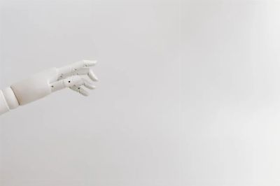 Minimalist image of a robotic hand reaching out on a white background.