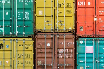 Vibrant cargo containers stacked in a shipping yard highlighting global trade.