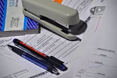 stapler, pen, paperwork, invoice, invoice book
