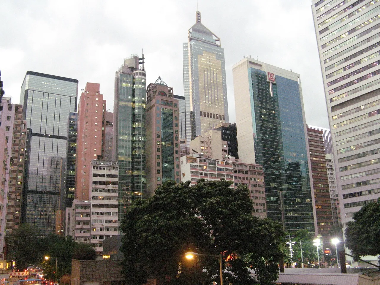Office towers in Hong Kong's business district under a clear sky