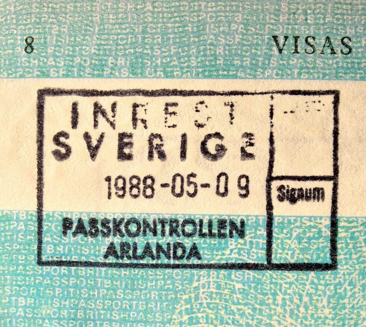 A passport page stamped by immigration control, the dated entry stamp filling the page.