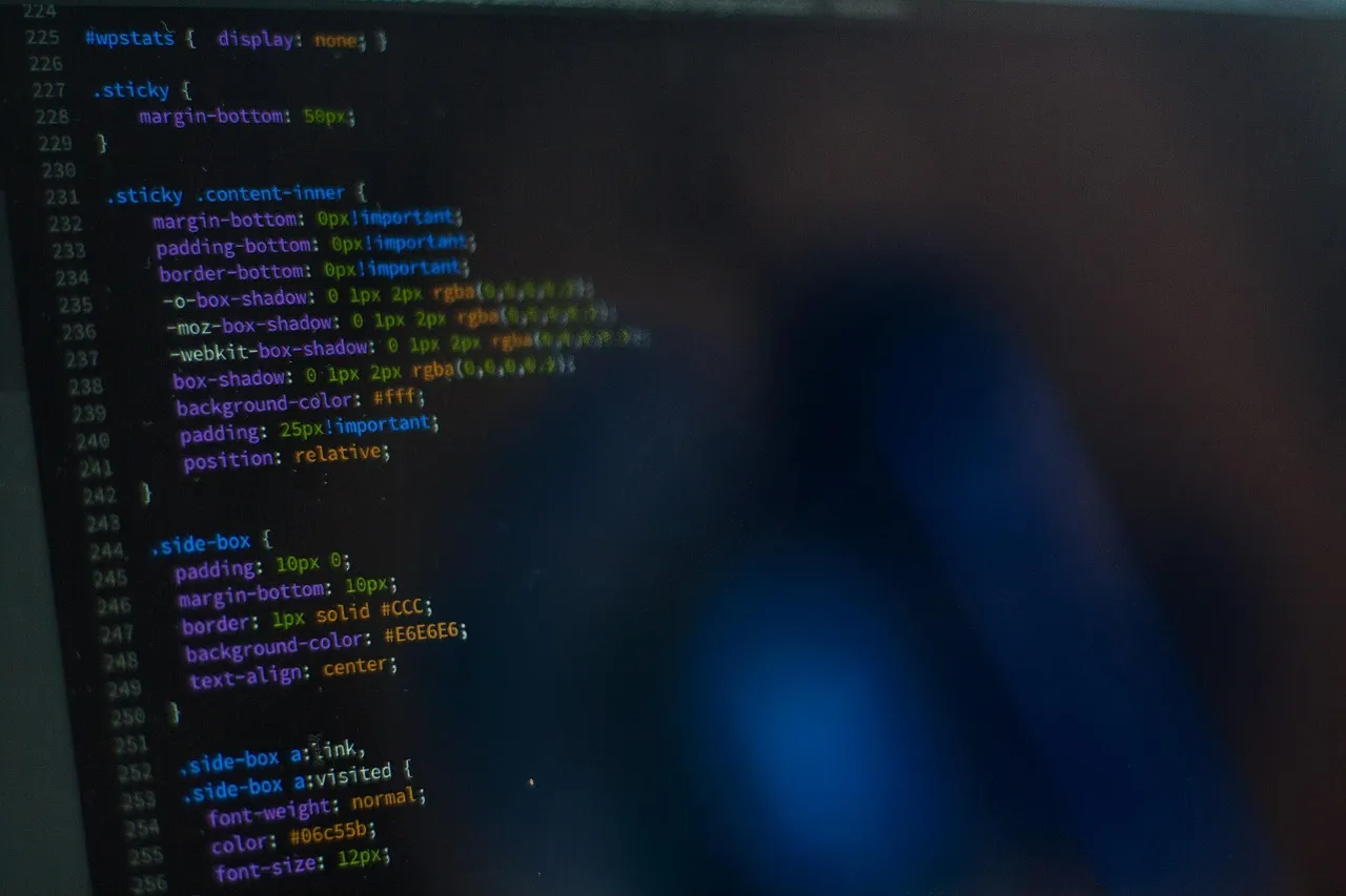 Coloured stylesheet source code on a dark editor screen with line numbers down the left margin