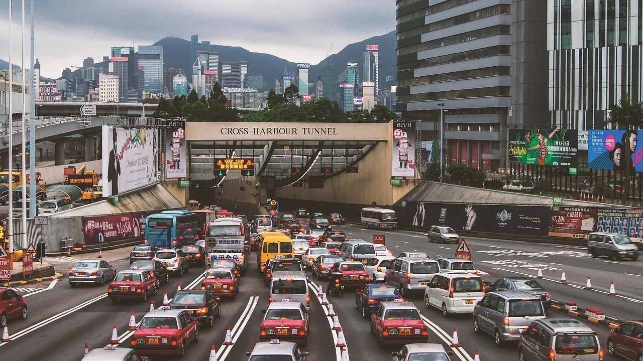 Queues of cars and red taxis approaching the Cross-Harbour Tunnel in Hong Kong