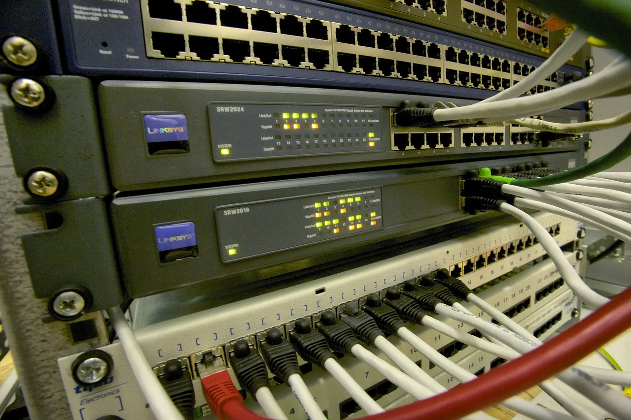 Network switches and routers in a rack with patch cables