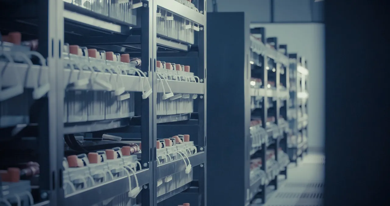 Rows of rack-mounted network equipment in a data centre, illustrating a report on a maximum-severity vulnerability in Microsoft's cloud identity service.