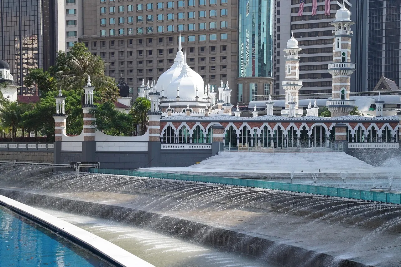Masjid Jamek in Kuala Lumpur; Tabung Haji helps Malaysian Muslims save for the haj pilgrimage