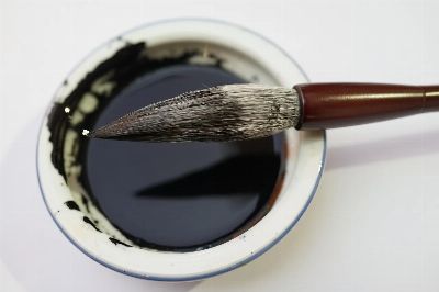 calligraphy brush, ink well, chinese calligraphy, aesthetically, artistic expression