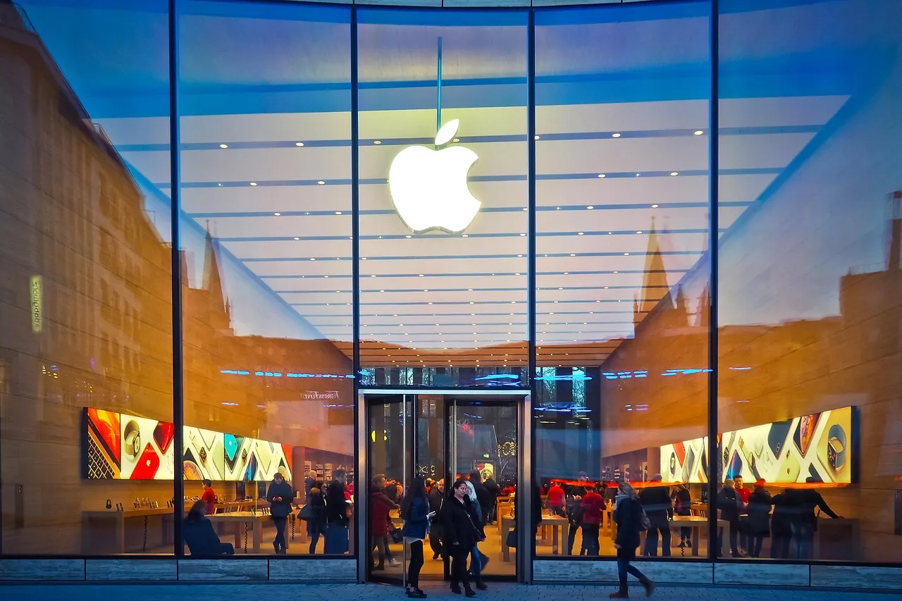 The illuminated logo above an Apple Store entrance, ahead of the company's first keynote under a new chief executive
