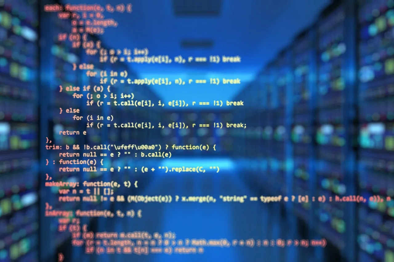 Lines of source code rendered over a darkened server room — illustrating the volume of small kernel fixes arriving from automated review.