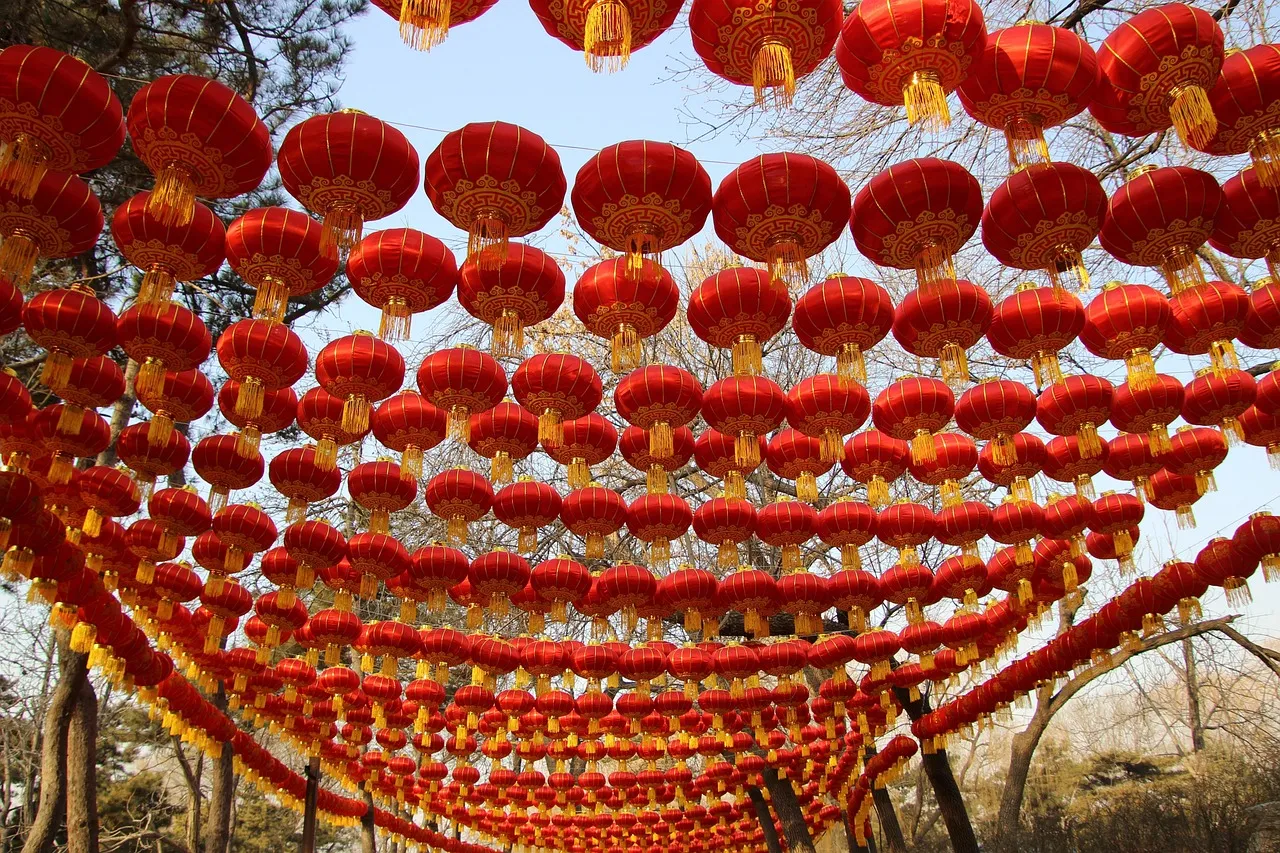 Rows of red paper lanterns hanging overhead