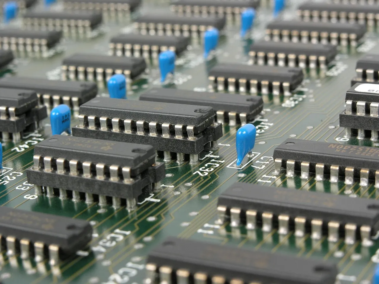 Rows of chips mounted on a green circuit board