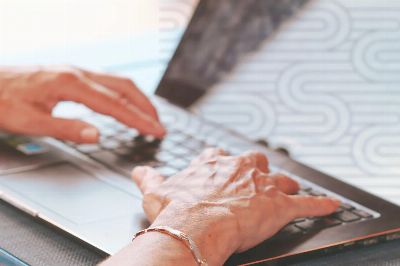 hands typing, elderly hands, typing on laptop, working on computer, female hands