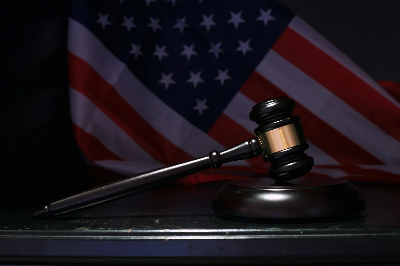 A gavel in front of a United States flag, representing the federal ruling on the Pentagon's supply-chain risk designation