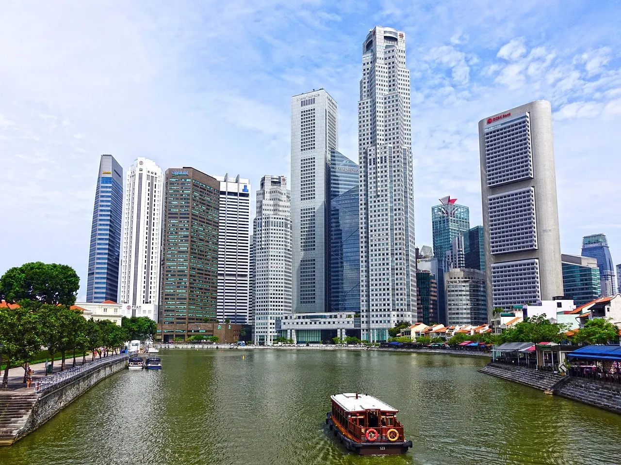 Singapore central business district towers seen across the river — illustrating the city that absorbed 94 per cent of the region's half-year technology funding.